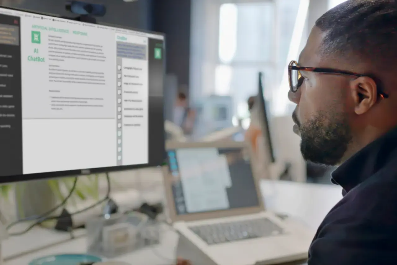 A imagem apresenta um homem jovem afro-americano que está em frente a um computador, usando o ChatGPT. O tema do artigo é IA generativa.